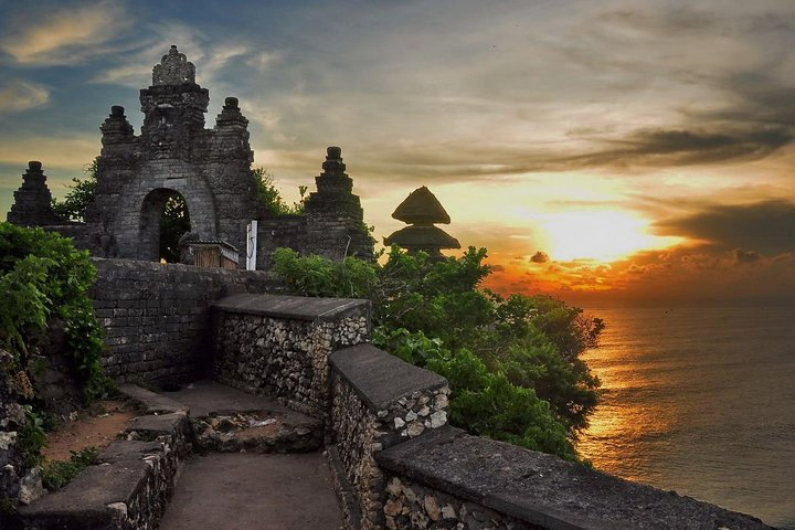 A breathtaking view of Uluwatu Temple during sunset