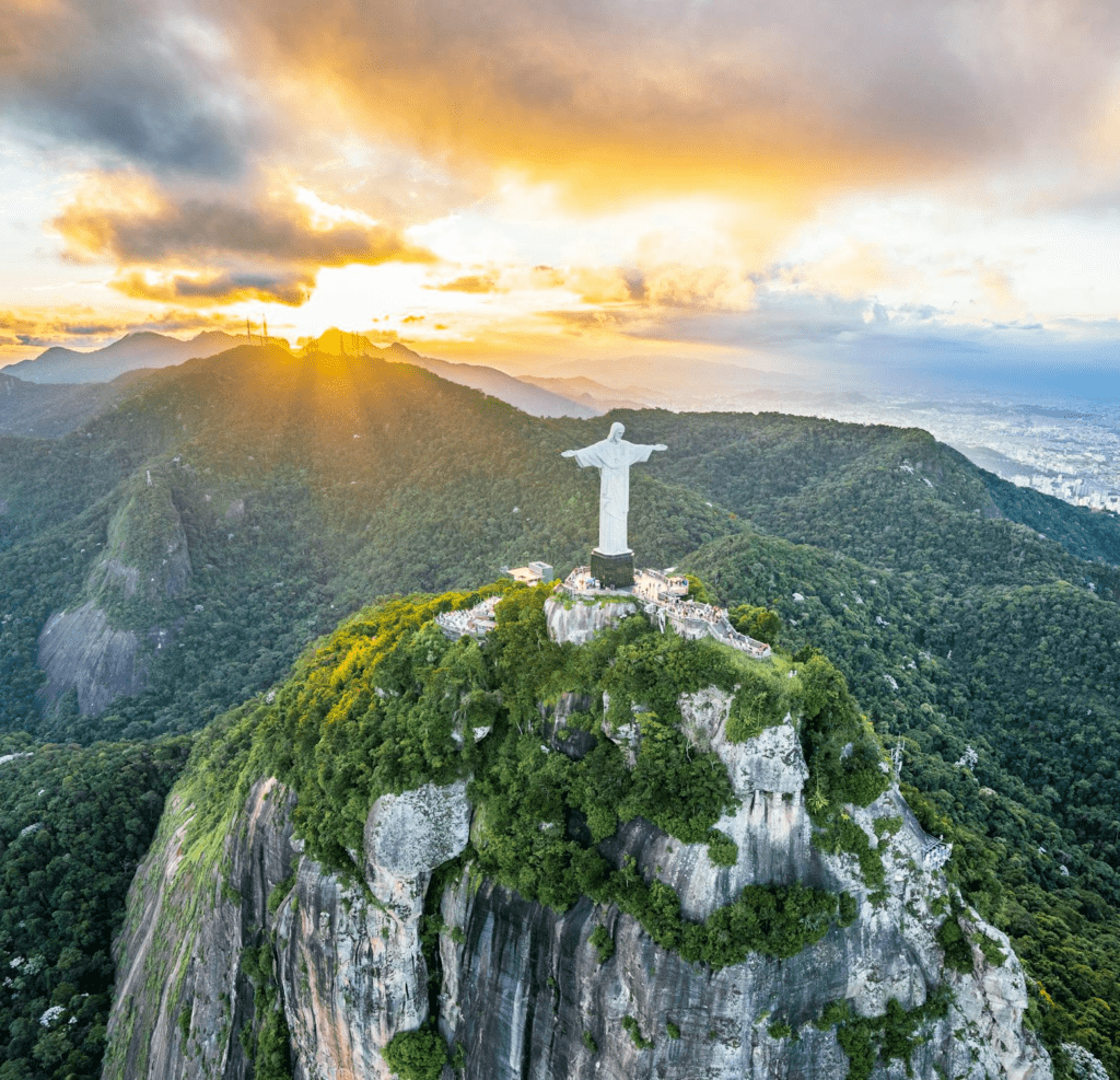 Sunset view of Christ the Redeemer overlooking Rio de Janeiro.